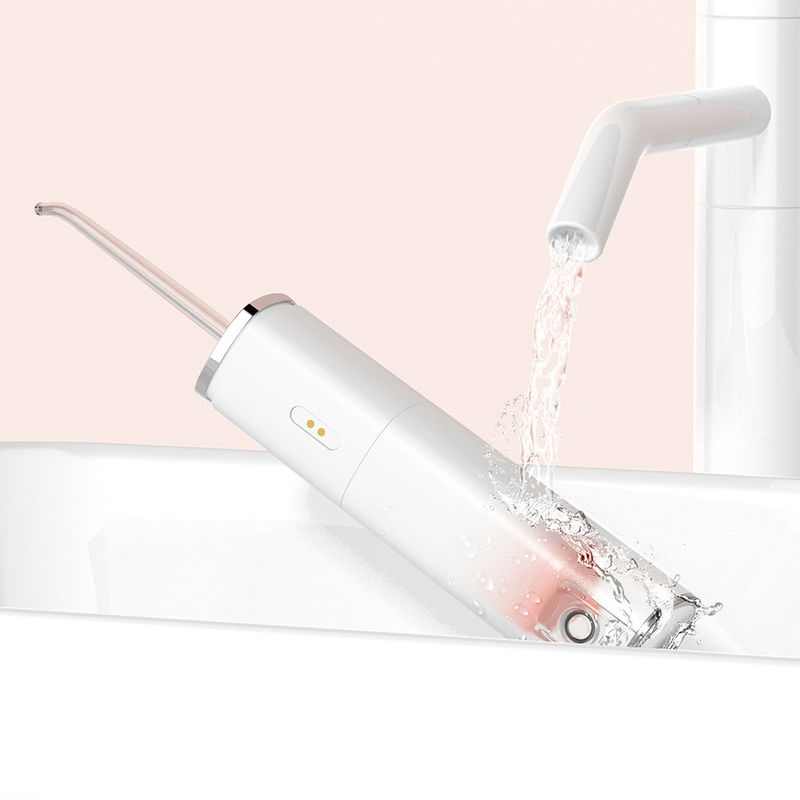 Nettoyage profond portatif de Sonic Cordless Water Flosser Rechargeable avec quatre becs